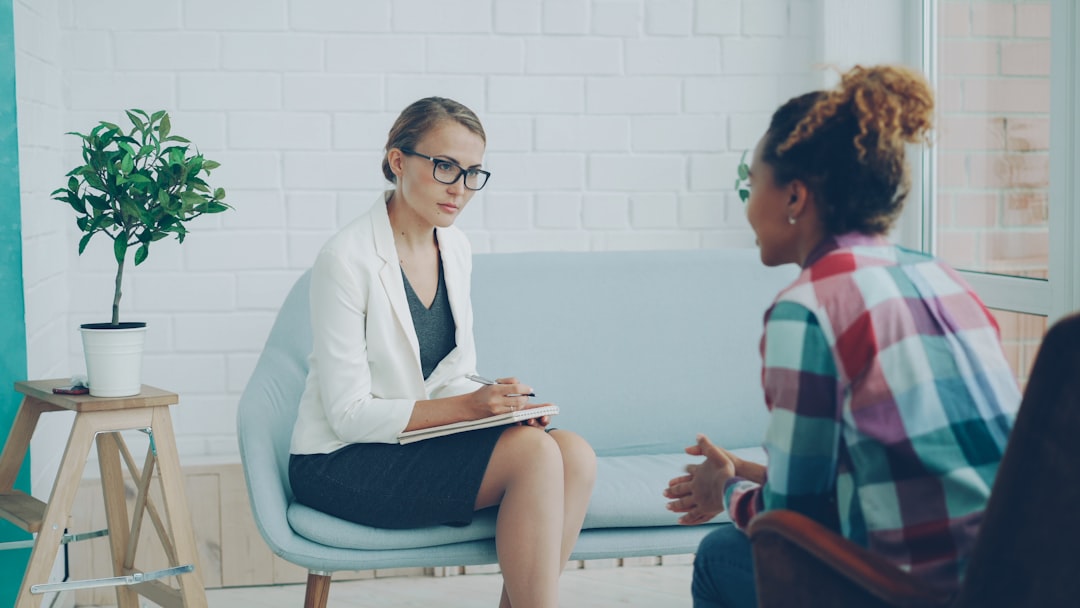 clinical evidence — Two women talking in a therapy session